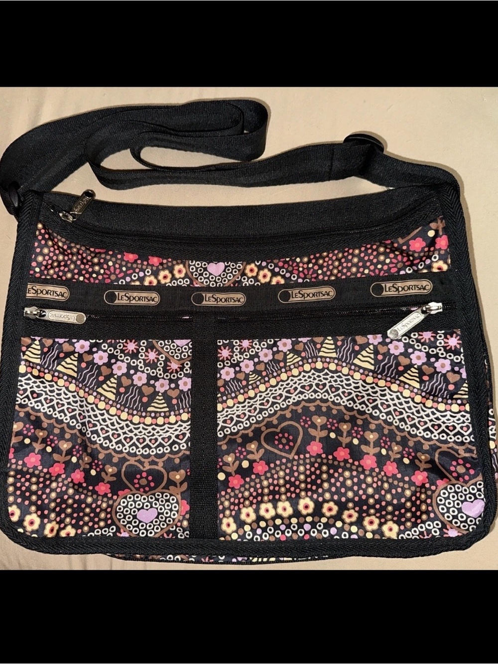 LeSportsac “Sasha Swish” Black Floral Heart Print Crossbody Bag